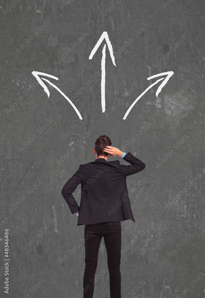 © Viorel Sima - confused business man thinking wich way to go © Viorel Sima - confused business man thinking wich way to go