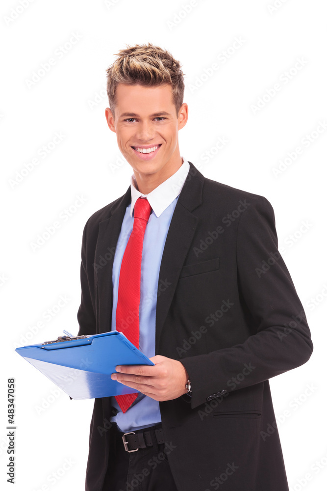 male business executive taking a notes on clipboard male business executive taking a notes on clipboard
