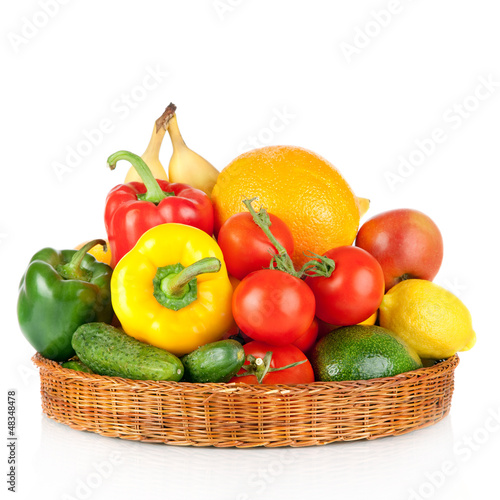 fruits and vegetables in basket isolated on a white background