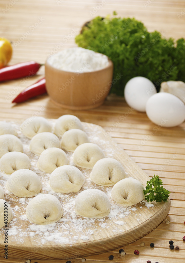 Meat dumplings on the kitchen board Meat dumplings on the kitchen board