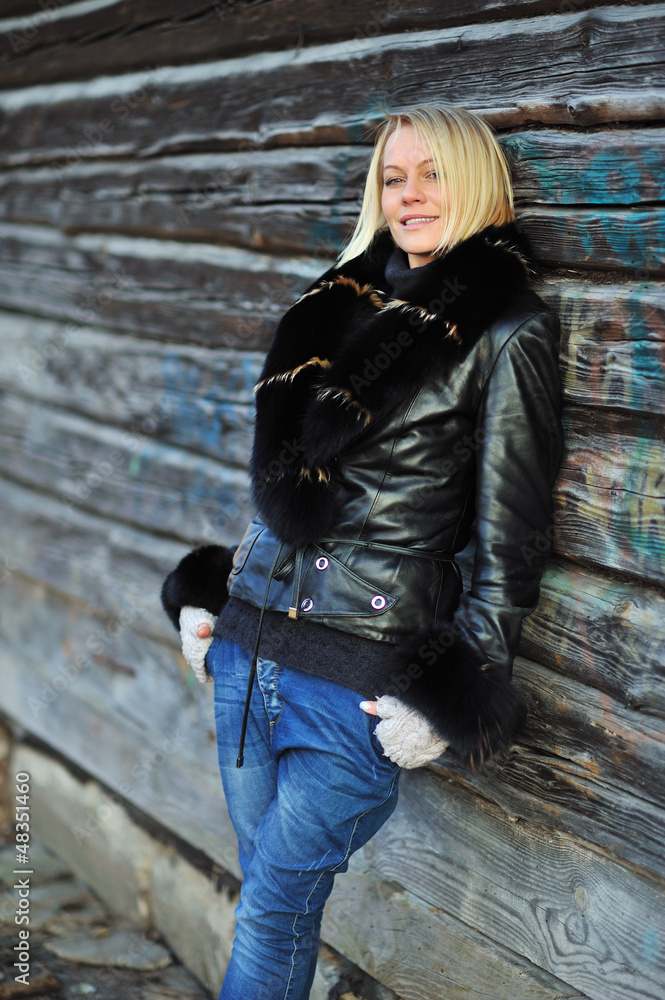 Portrait of a beautiful blond woman posing outdoors Portrait of a beautiful blond woman posing outdoors