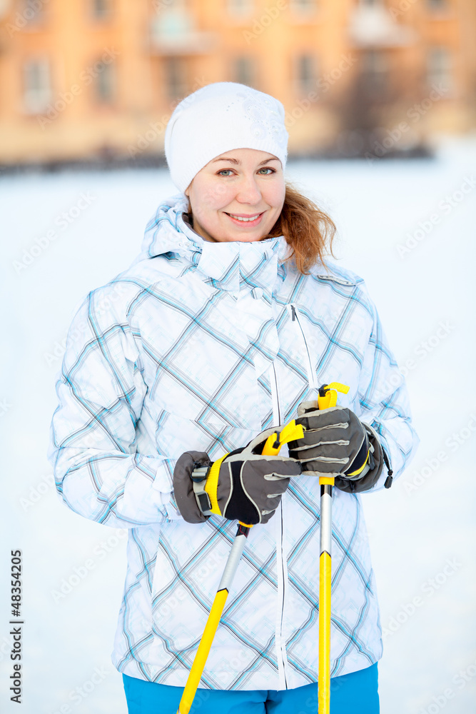 Sportswoman portrait with ski equipment Sportswoman portrait with ski equipment