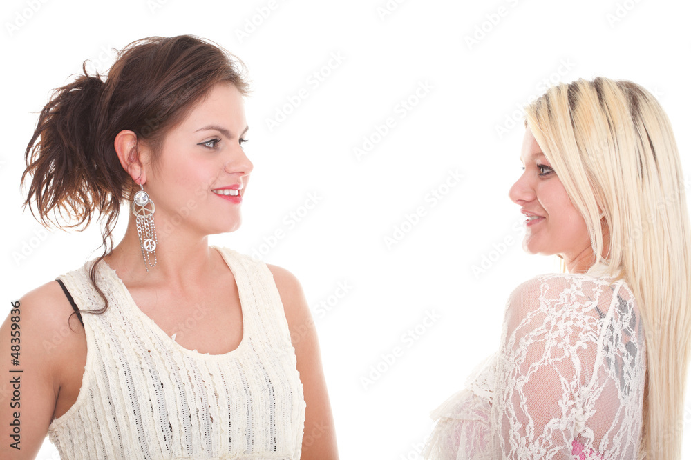 portrait of two women Smiling girls shopping isolated white portrait of two women Smiling girls shopping isolated white