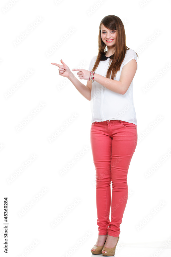 Beautiful woman standing and pointing up Beautiful woman standing and pointing up