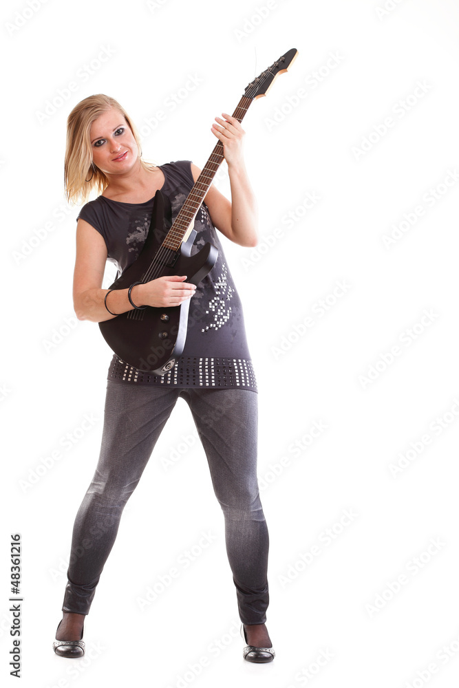 Woman with black guitar looking isolated Woman with black guitar looking isolated