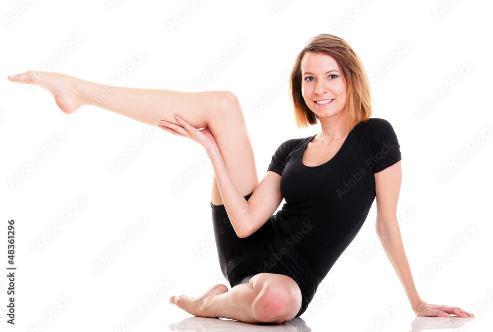 Sport Young woman doing exercise isolated on white Sport Young woman doing exercise isolated on white