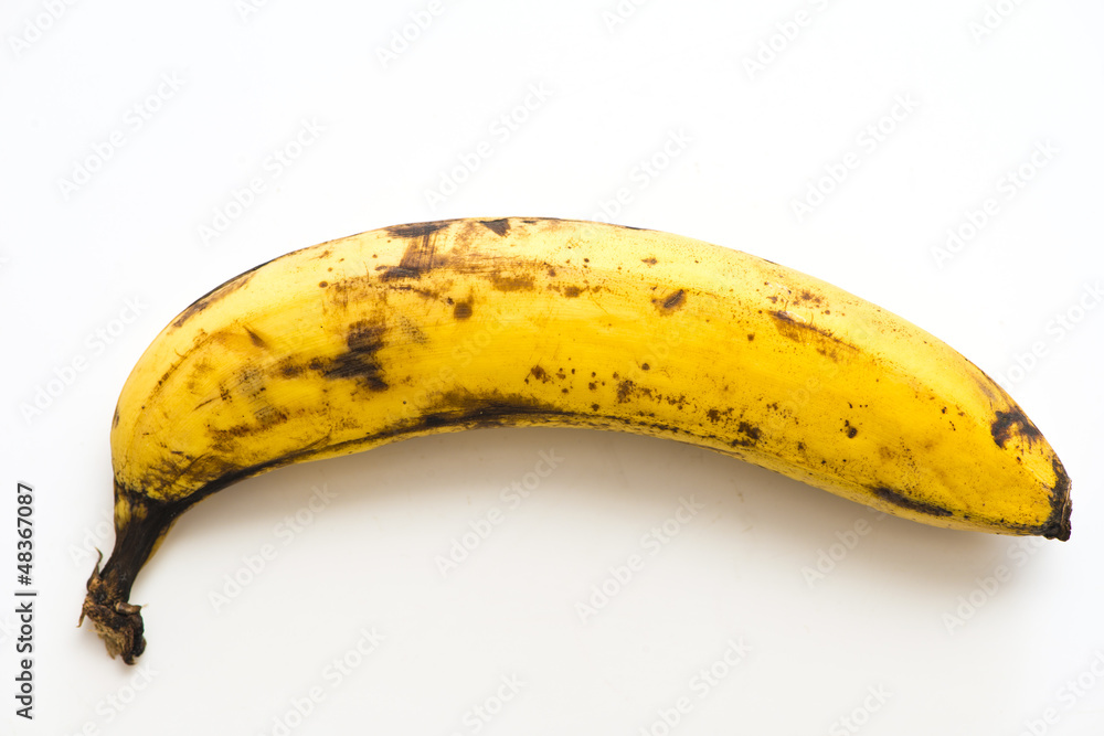 rotten banana on white