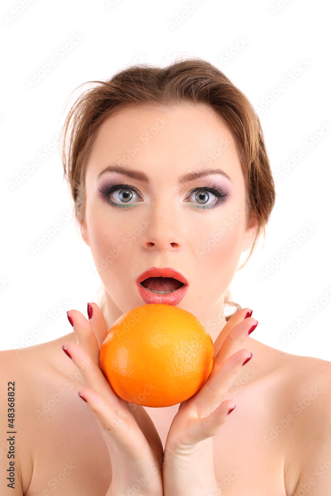 Beautiful young woman with bright make-up, holding orange, Beautiful young woman with bright make-up, holding orange,