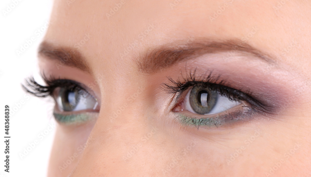 Fototapeta premium Beautiful female eyes with bright make-up, close up