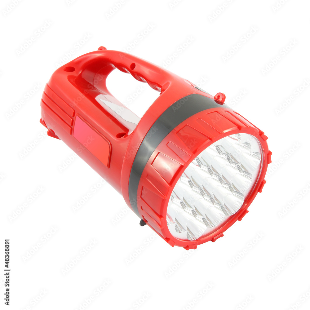 Red plastic pocket handle flashlight on white background.