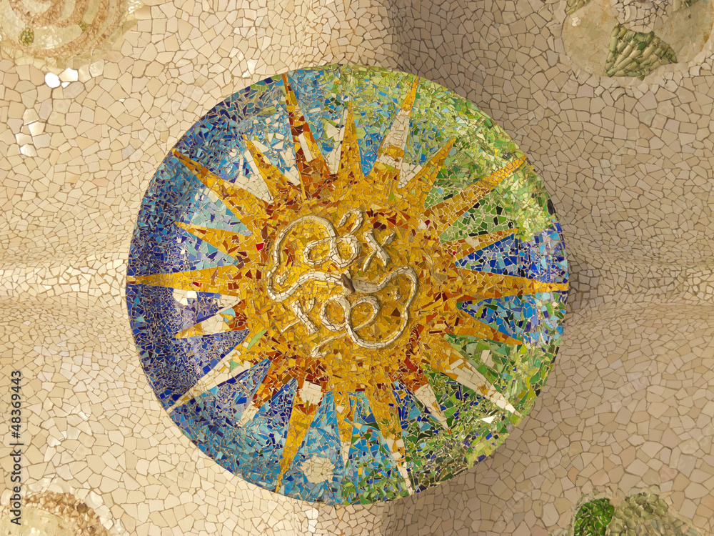Naklejka premium Ceiling with mosaic sun of Park Guell