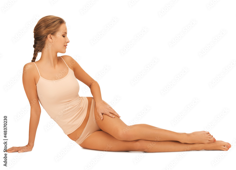 Obraz premium woman in cotton underwear touching her legs