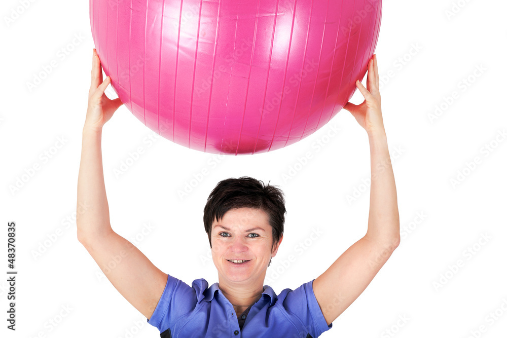 Sporty woman doing exercise with gym ball Sporty woman doing exercise with gym ball
