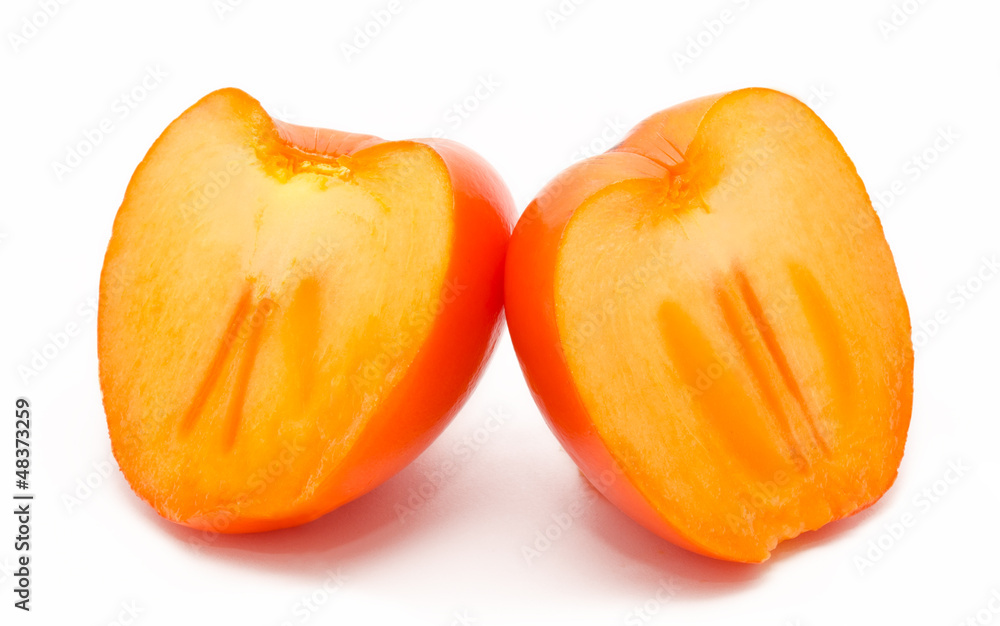Orange ripe persimmon isolated on white