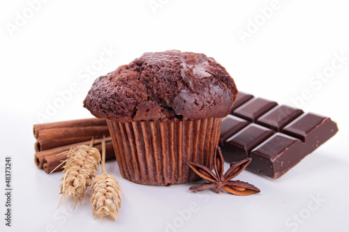 chocolate muffin and ingredient on white