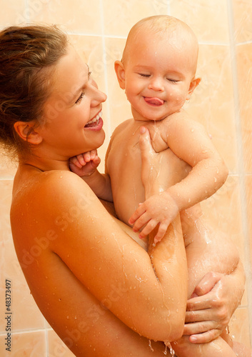 Mother and baby daughter in the shower