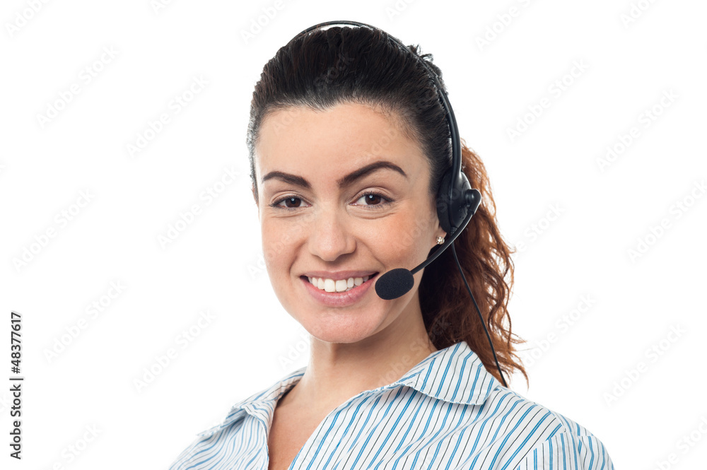 Closeup smiling portrait of a call centre executive Closeup smiling portrait of a call centre executive