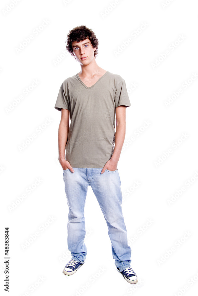 Young man standing with hands in pockets Young man standing with hands in pockets
