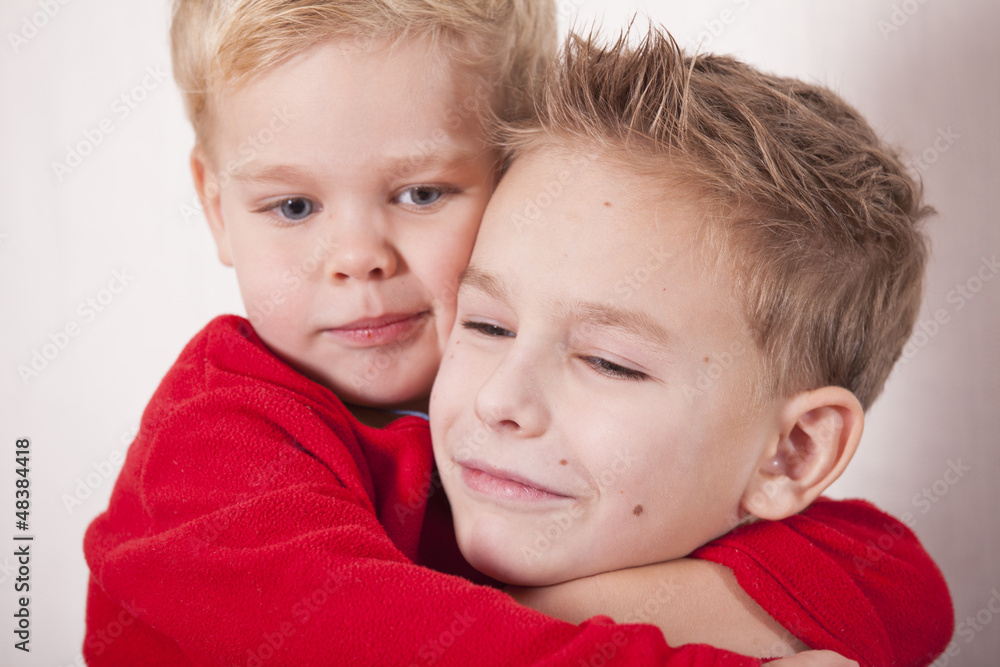 Boys embracing Boys embracing