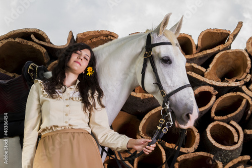 classical girl with a white horse