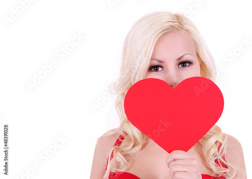 portrait of blonde woman with Valentine heart  isolated