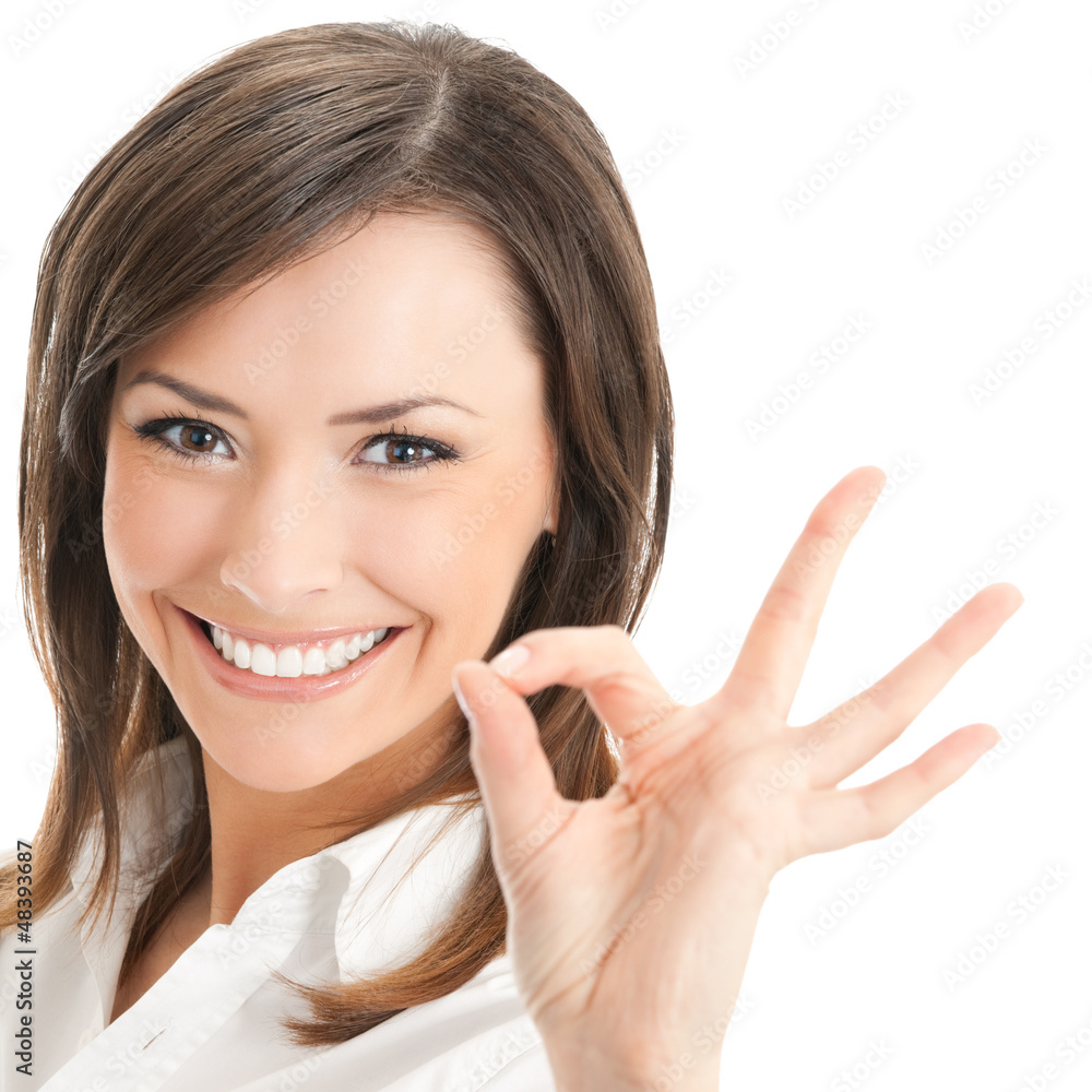 Businesswoman with okay gesture, isolated Businesswoman with okay gesture, isolated