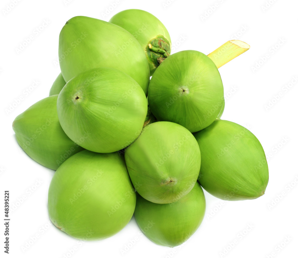 Obraz premium Green coconuts over white background