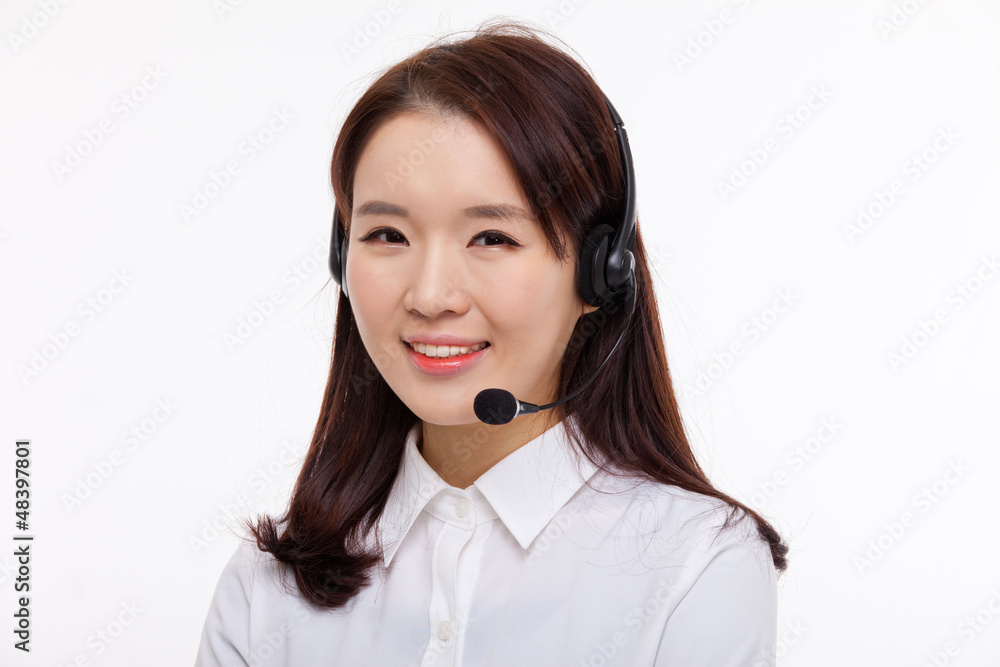 Smiling call center operator business woman show thumbs Smiling call center operator business woman show thumbs