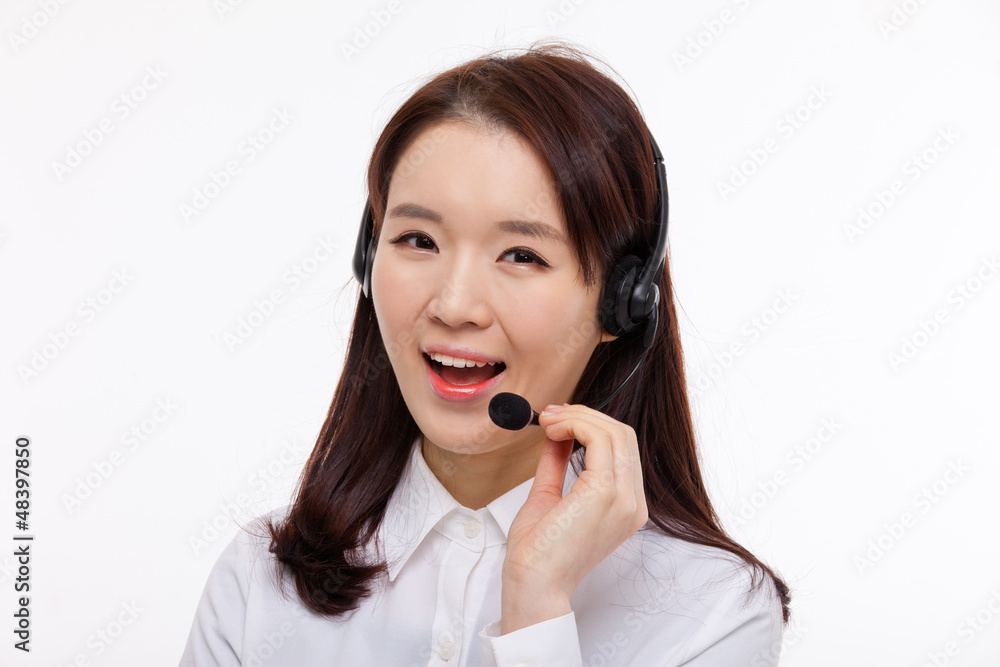 Smiling call center operator business woman show thumbs Smiling call center operator business woman show thumbs