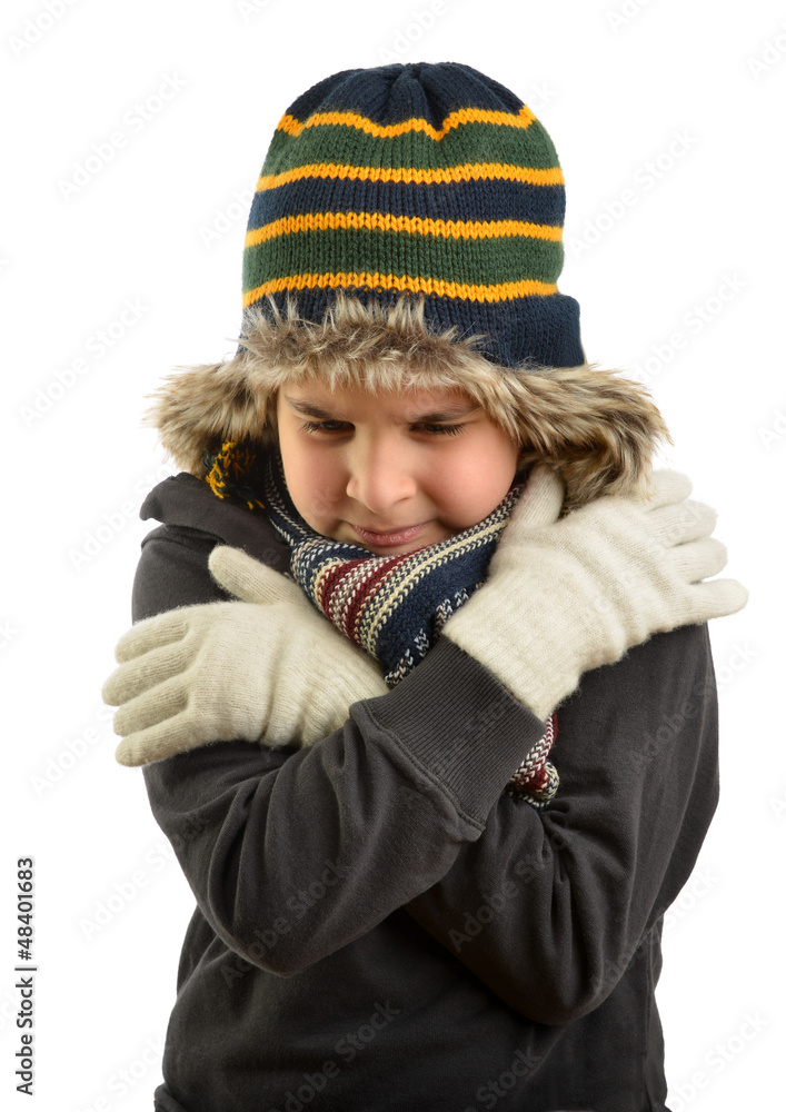 Little child wearing beanie trying to warm up Little child wearing beanie trying to warm up