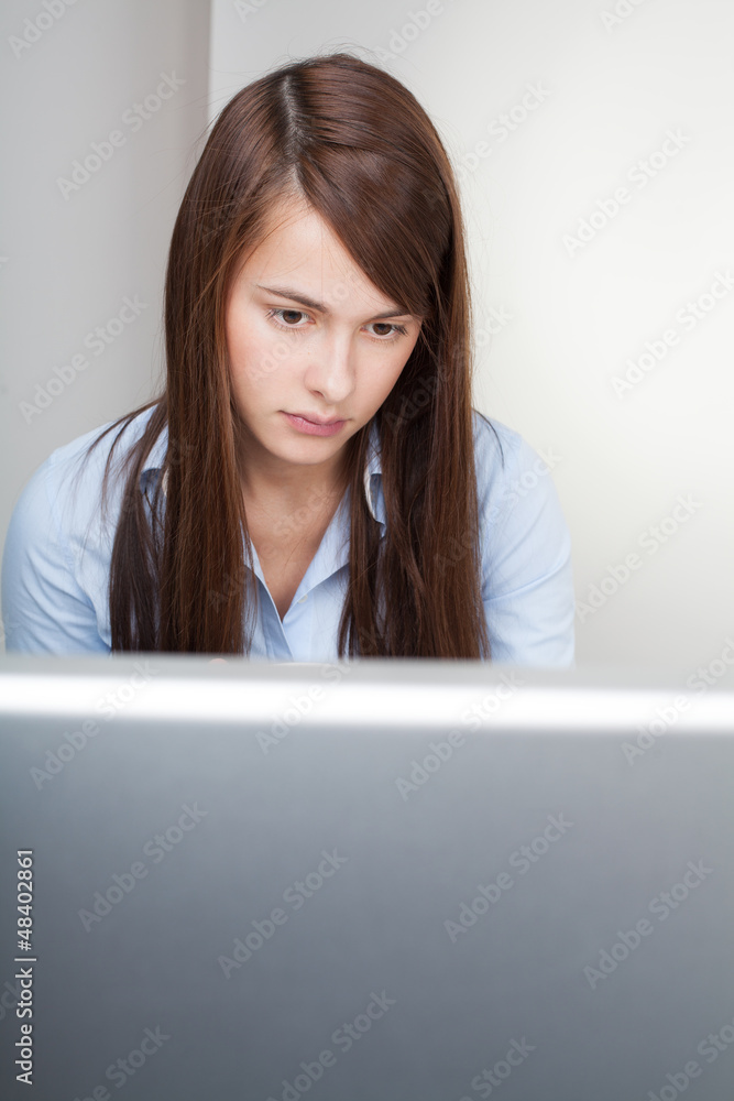 Beautiful woman working on a computer Beautiful woman working on a computer
