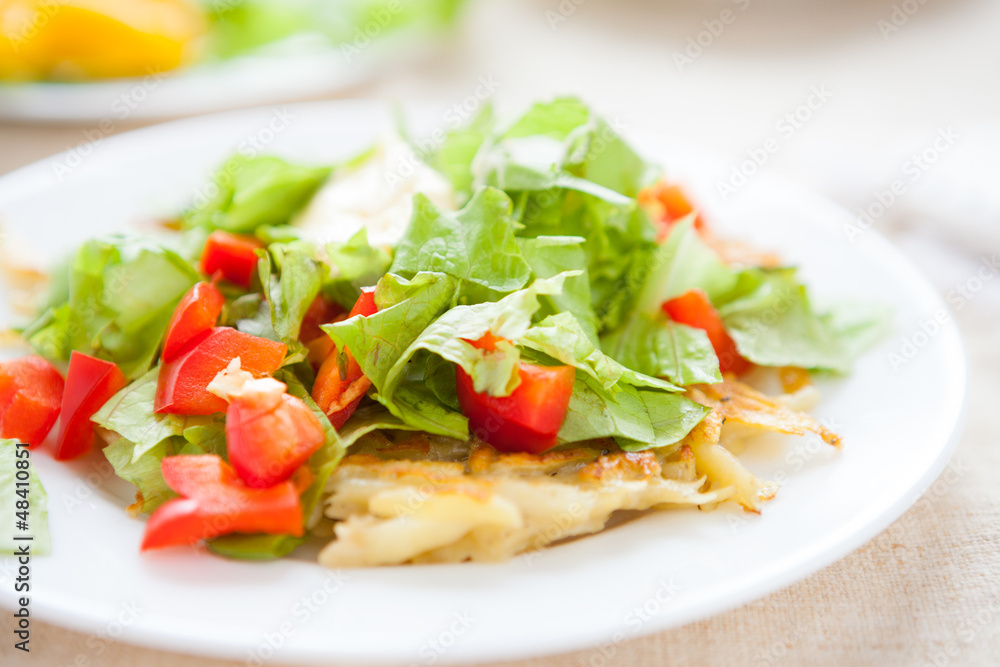 Potato pancakes with lettuce top Potato pancakes with lettuce top