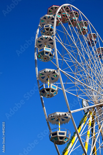 Attraction is the wheel of review on background blue sky