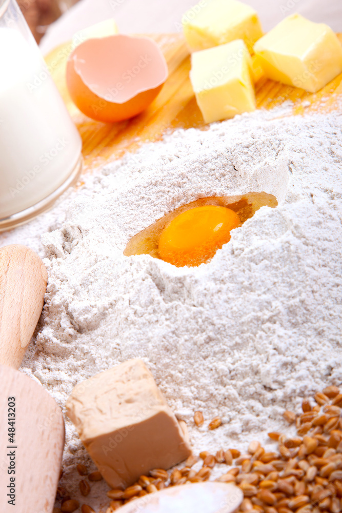 flour and eggs, butter, ingredients for baking. flour and eggs, butter, ingredients for baking.