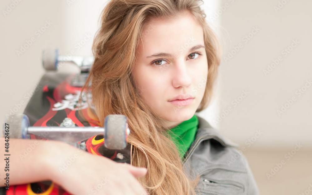 Portrait of pretty girl with skateboard outdoor. Portrait of pretty girl with skateboard outdoor.