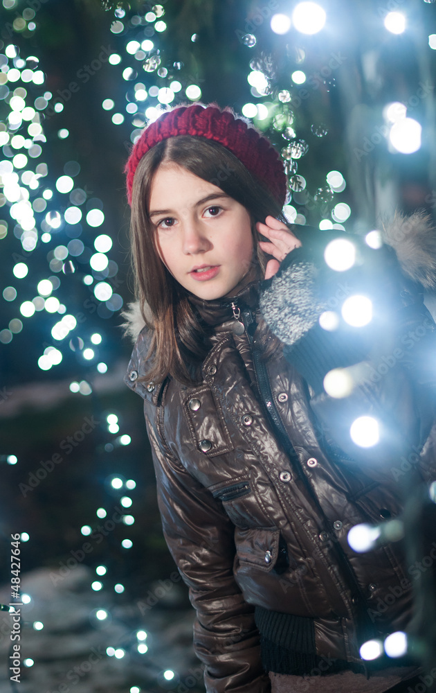 Portrait of young beautiful girl in winter style