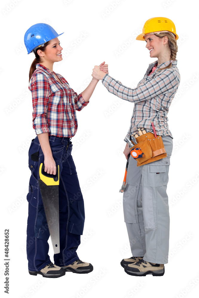 Happy female manual workers Happy female manual workers