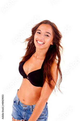Beautiful young woman dressing bikini and shorts