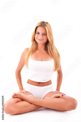 Young blonde woman doing yoga © Trendsetter Images