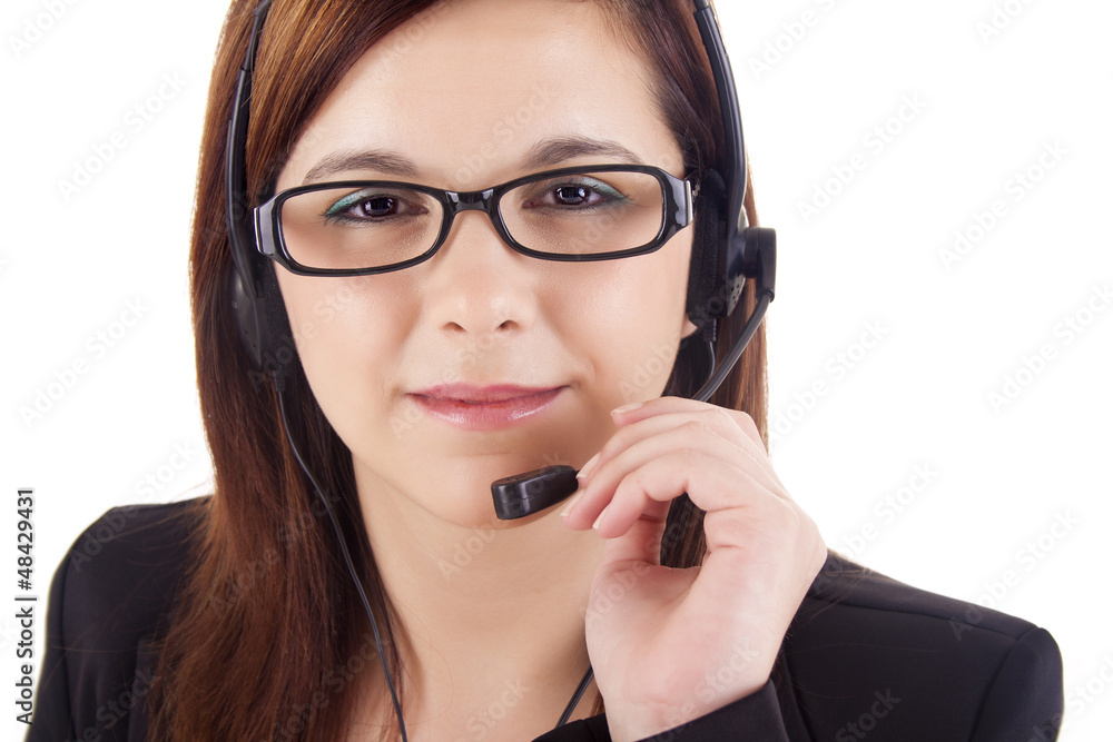 Portrait of a happy young call centre employee smiling with a he Portrait of a happy young call centre employee smiling with a he