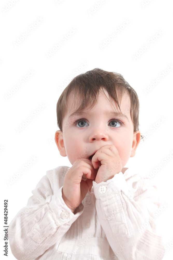 Baby scared with her hands in the mouth Baby scared with her hands in the mouth