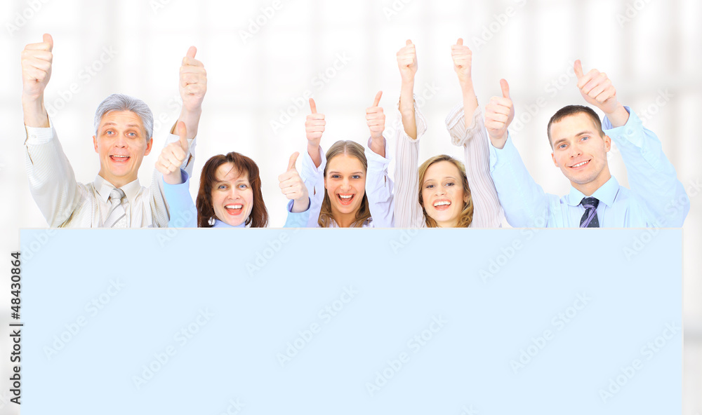 group of business people holding a banner group of business people holding a banner