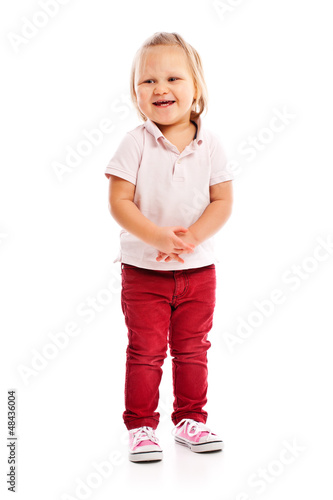 happy little child posing in studio