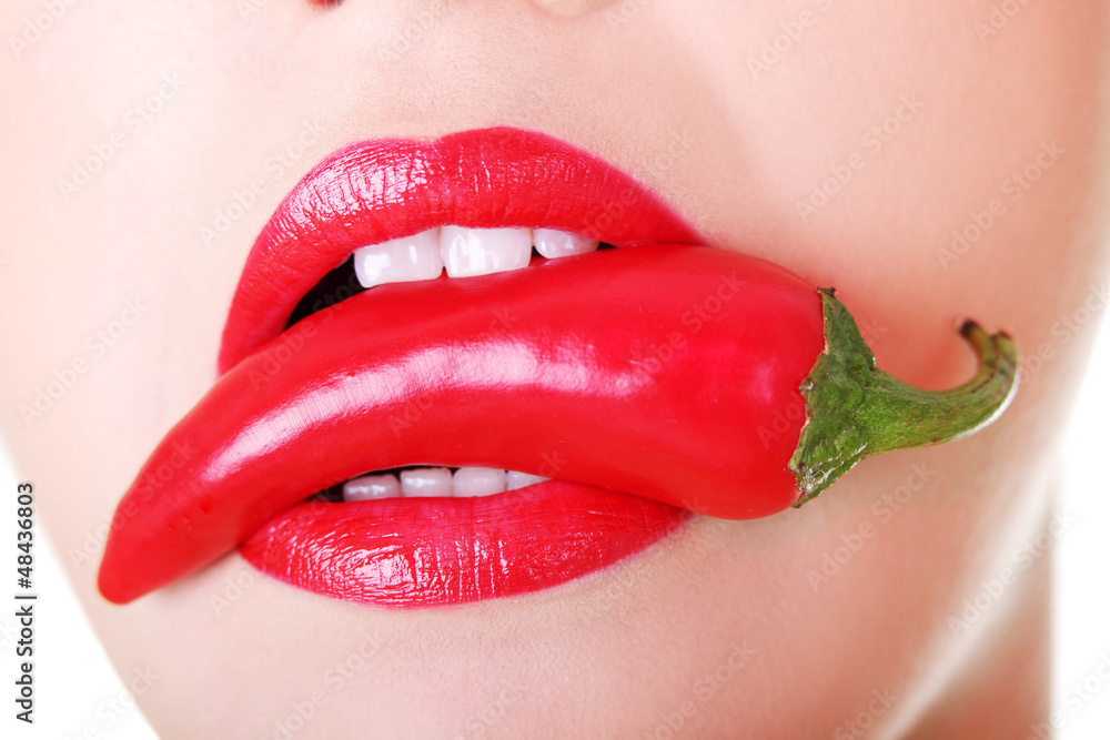 Fototapeta premium Beautiful woman with hot paprika