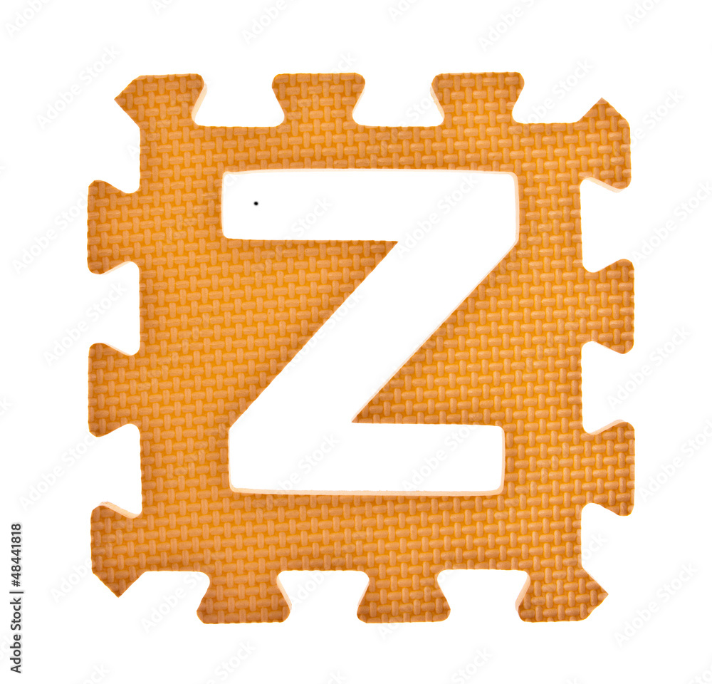Fototapeta premium Alphabet toy piece isolated on white background