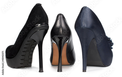 Rear view of three ladies stiletto shoes