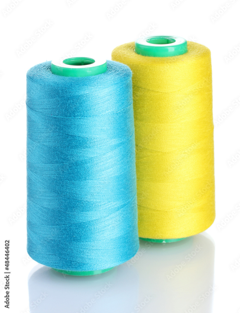 Bobbins of thread isolated on white Bobbins of thread isolated on white
