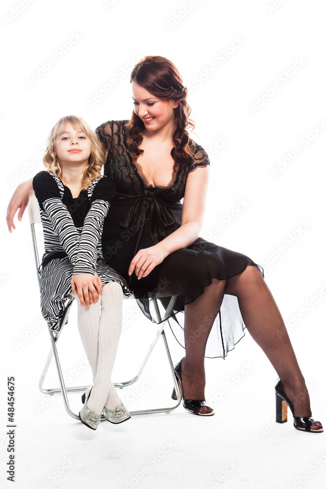 Fototapeta premium Young and beautiful mother with a beautiful daughter
