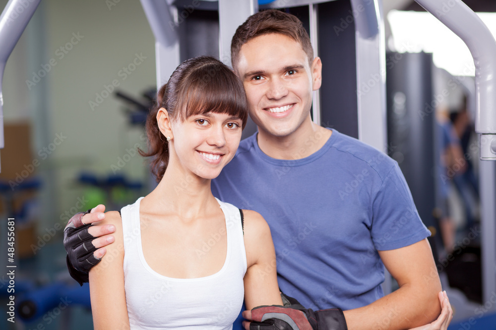 Young couple in a gym Young couple in a gym