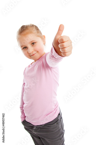 Little girl showing thumbs up.